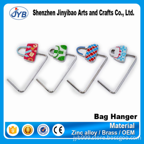 wholesale cheap metal restaurant unfoldable bag hanger on table top